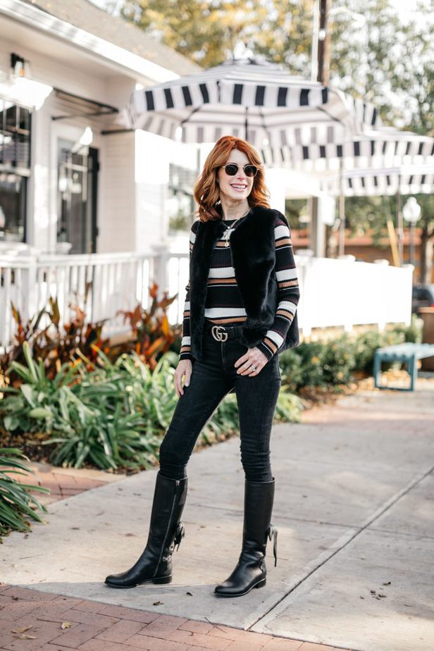 Dallas Fashion Blogger wearing a black faux fur vest from Topshop
