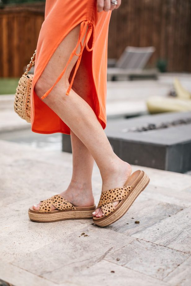 woman wearing wedge sandals 