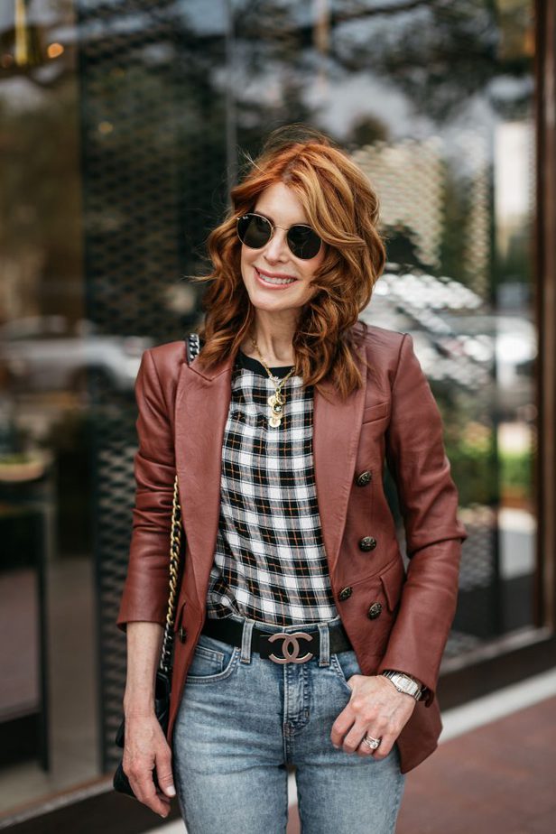 woman smiling and wearing her Leather Blazer