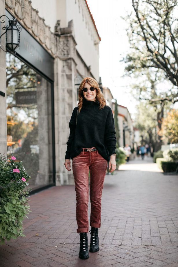 woman wearing black sweater and red jeans for Corduroy Weather