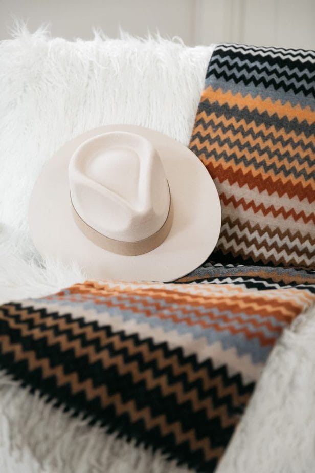 hat on top of a carpet