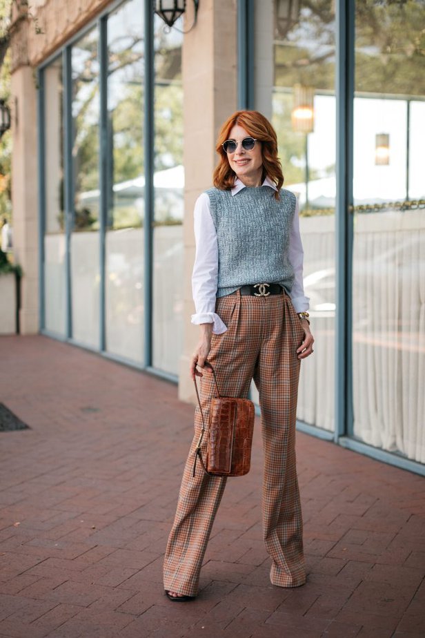 woman wearing white top and TRENDING-PUDDLE PANTS
