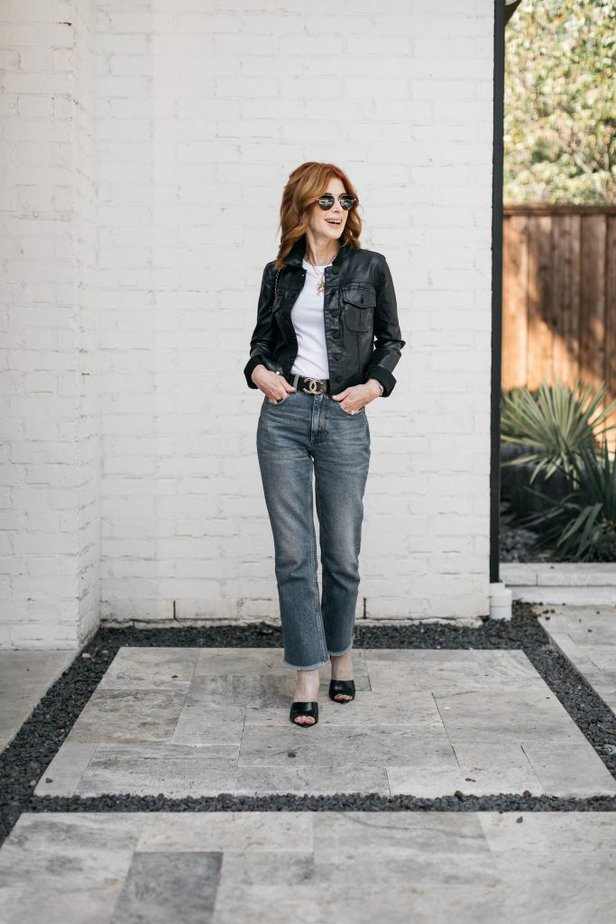 Dallas fashion blogger over 50 wearing coated denim jacket with medium wash denim and black mules in this Brand Spotlight- Evereve.
